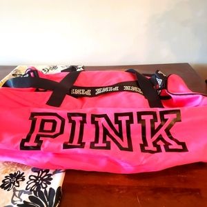 Giant Vs pink duffel bag